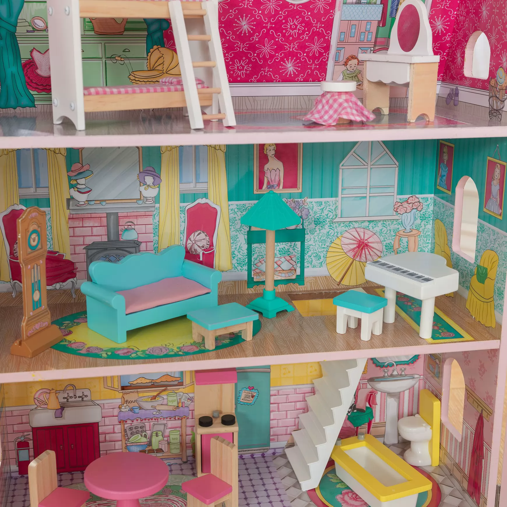 Imagen donde se pueden ver las tres alturas con sus accesorios de la casa de muñecas kidkraft abbey manor 65941