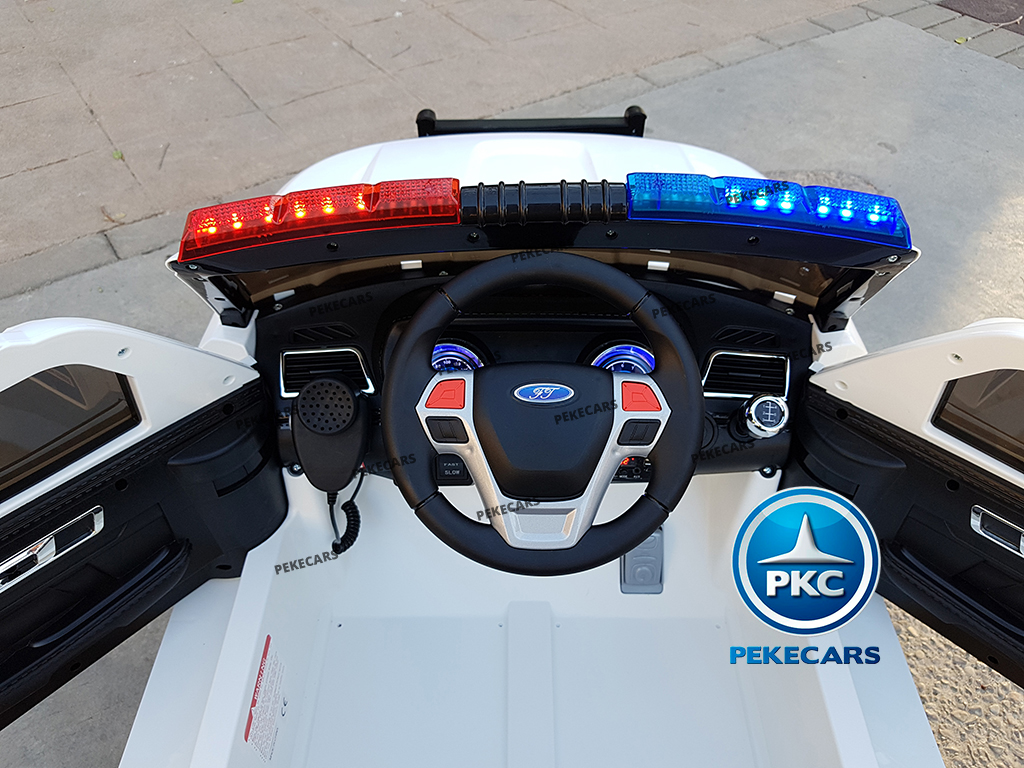 Coche eléctrico de Policia Blanco 12V 2.4G vista atrás