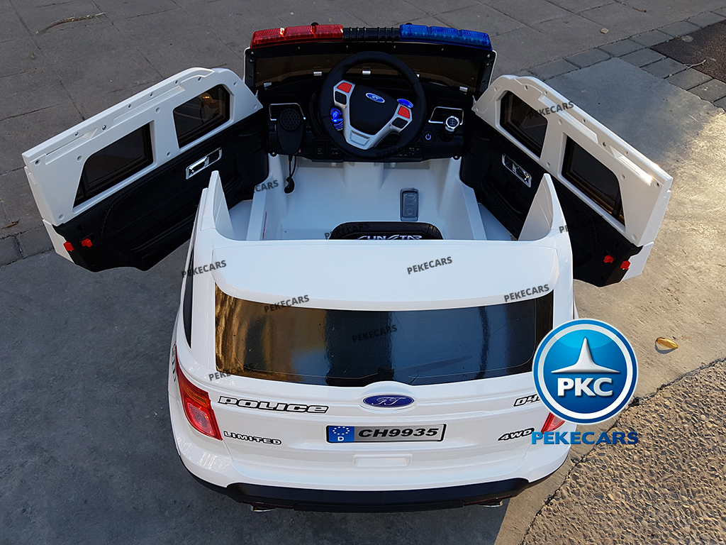 Coche eléctrico de Policia Blanco 12V 2.4G vista atrás