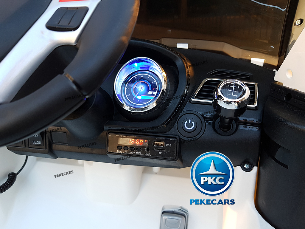 Coche eléctrico de Policia Blanco 12V 2.4G vista atrás