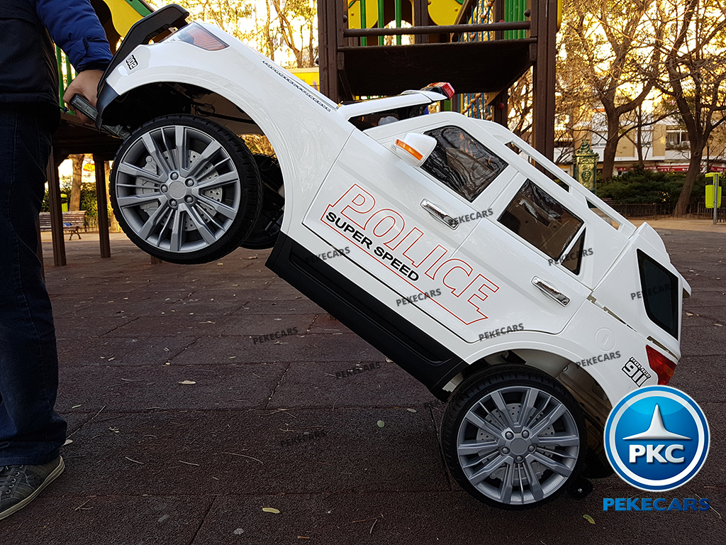 Coche eléctrico de Policia Blanco 12V 2.4G vista atrás