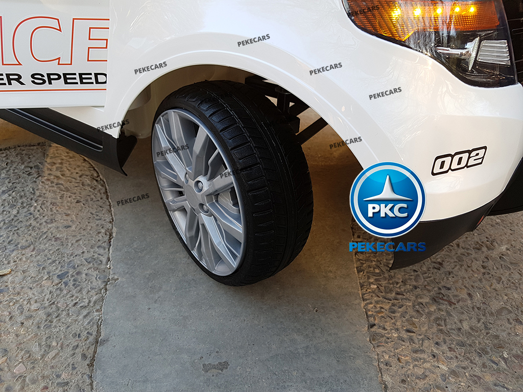 Coche eléctrico de Policia Blanco 12V 2.4G vista atrás