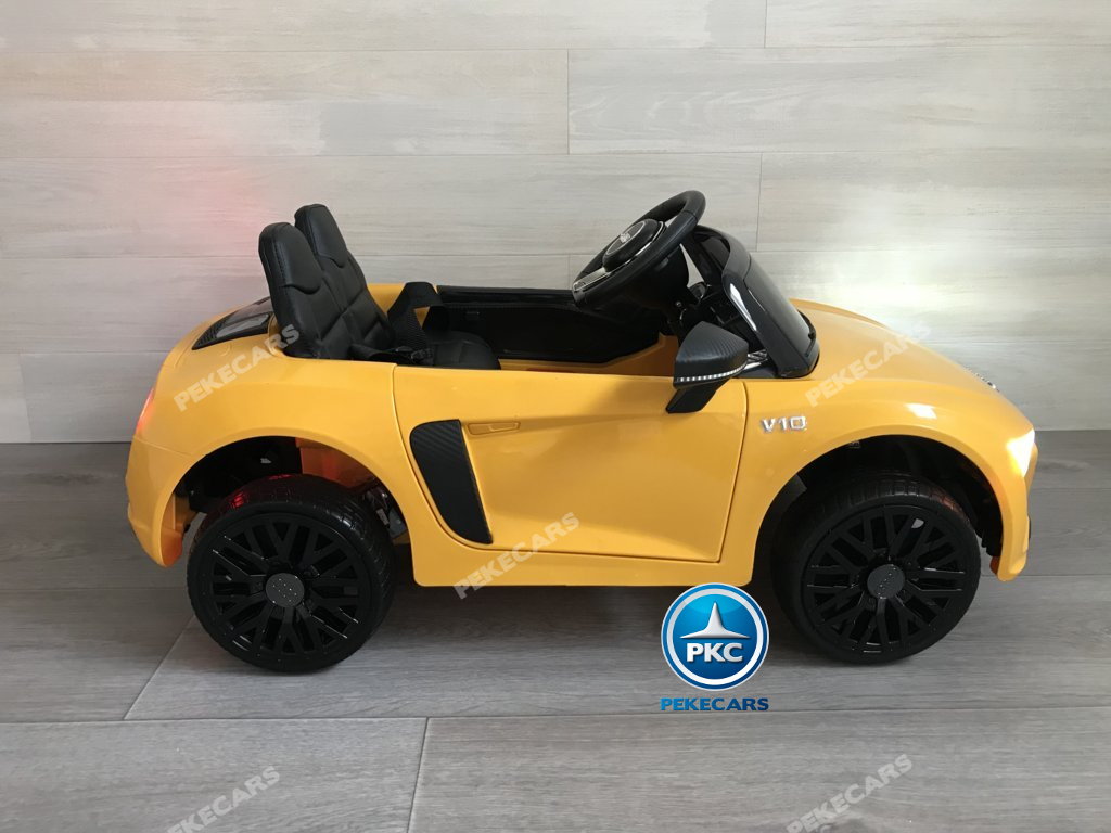 Coche electrico infantil Audi Little R8 Spyder Amarillo visto de lado