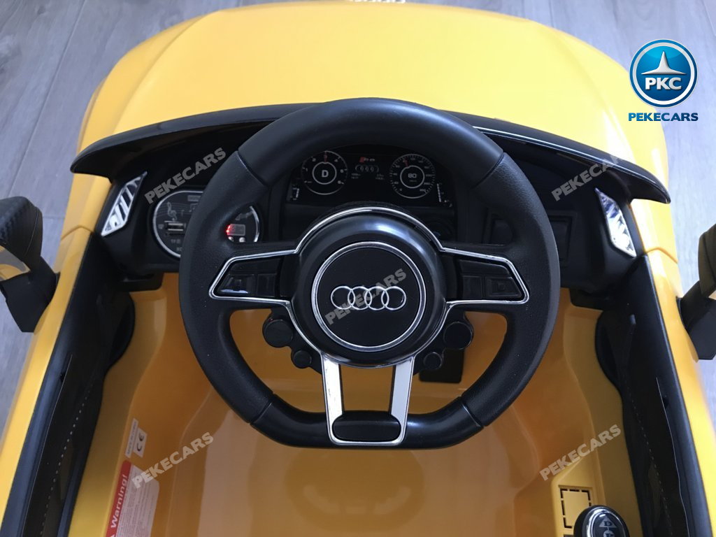 Coche electrico para niños Audi Little R8 Spyder Amarillo volante con claxon y musica