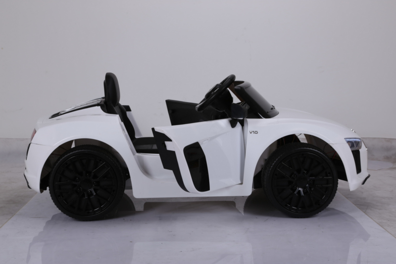 Coche eléctrico infantil Audi R8 Spyder Blanco con asiento acolchado en polipiel