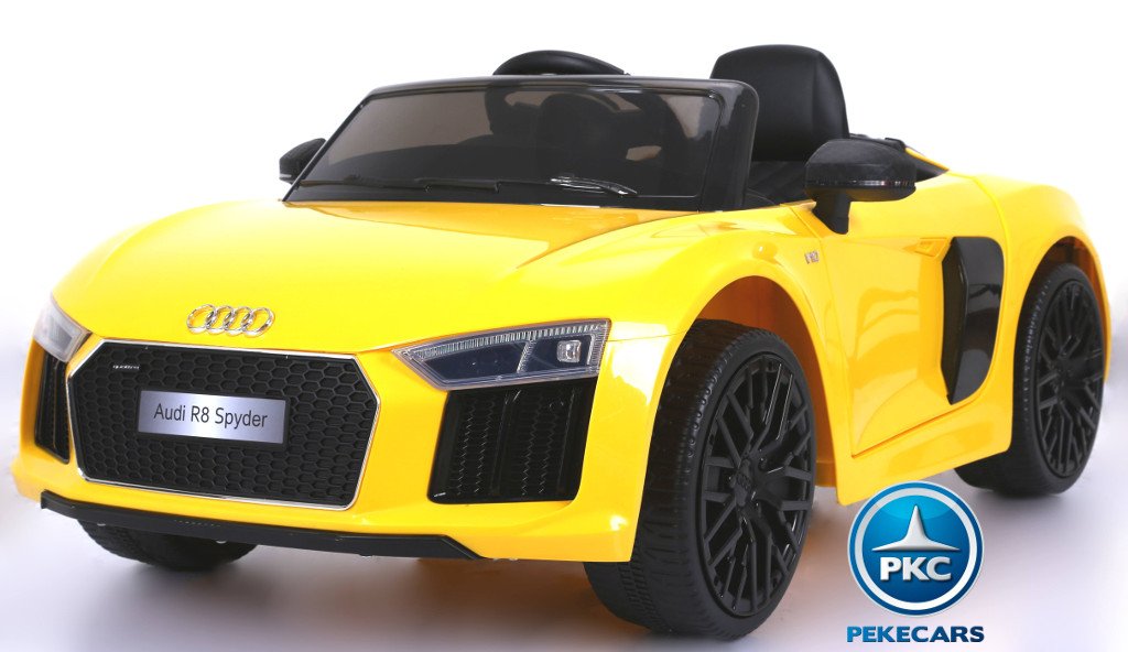 Coche eléctrico infantil Audi R8 Spyder amarillo con asiento en polipiel