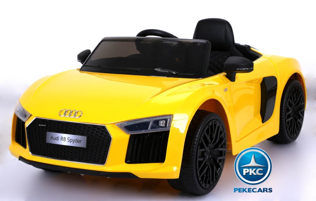 Coche electrico para niños Audi R8 Spyder amarillo con ruedas de caucho antipinchazos