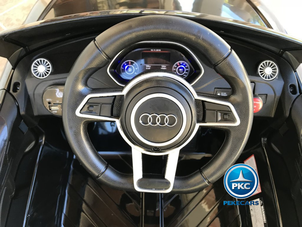 Coche electrico para niños Audi TT Negro Metalizado volante con claxon y musica