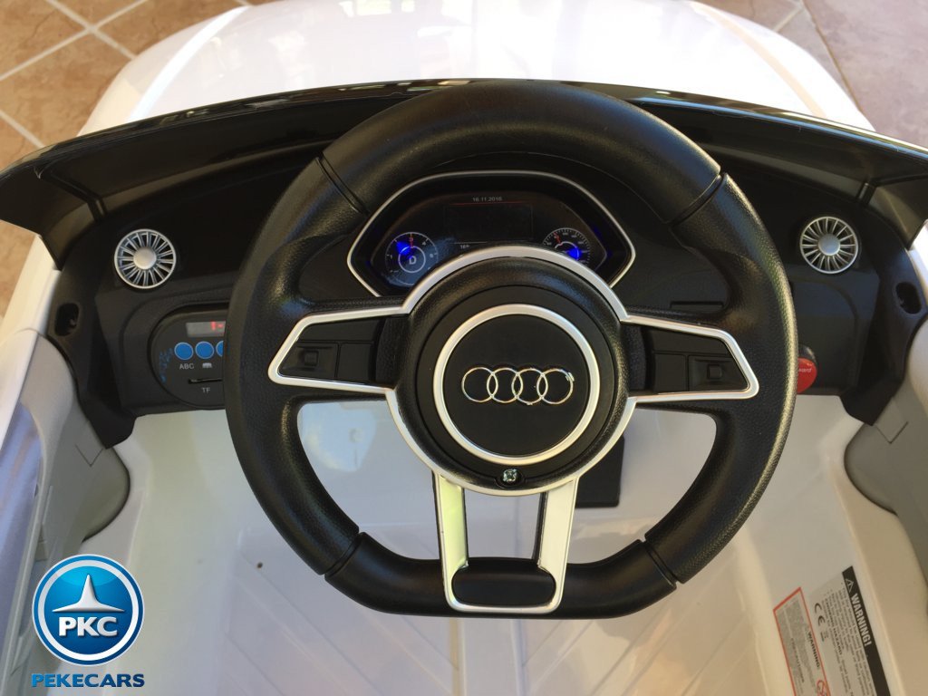 Coche electrico para niños Audi TT Blanco volante con claxon y musica