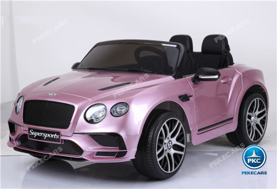 Coche electrico infantil Bentley Continental Supersports 12V Rosa Metalizado volante con música y claxon