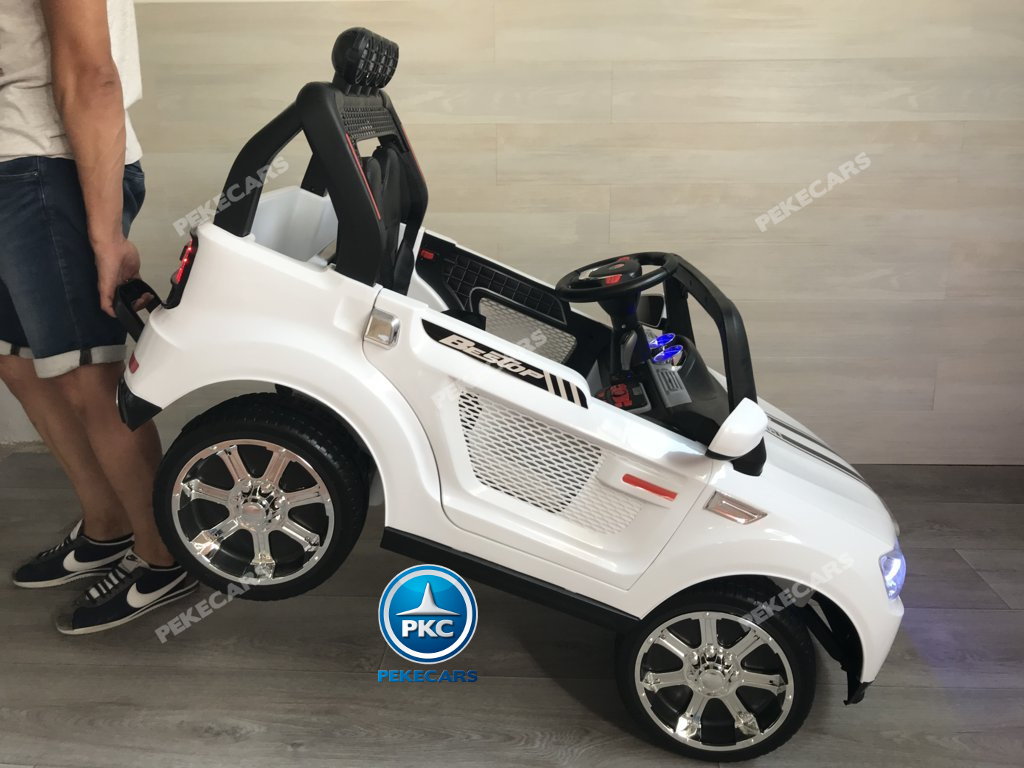 Coche electrico infantil BMW X7 Style 12V Blanco con asa de transporte