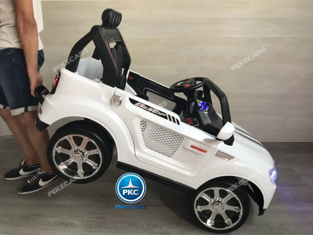 Coche electrico infantil BMW X7 Style 12V Blanco con asa de transporte