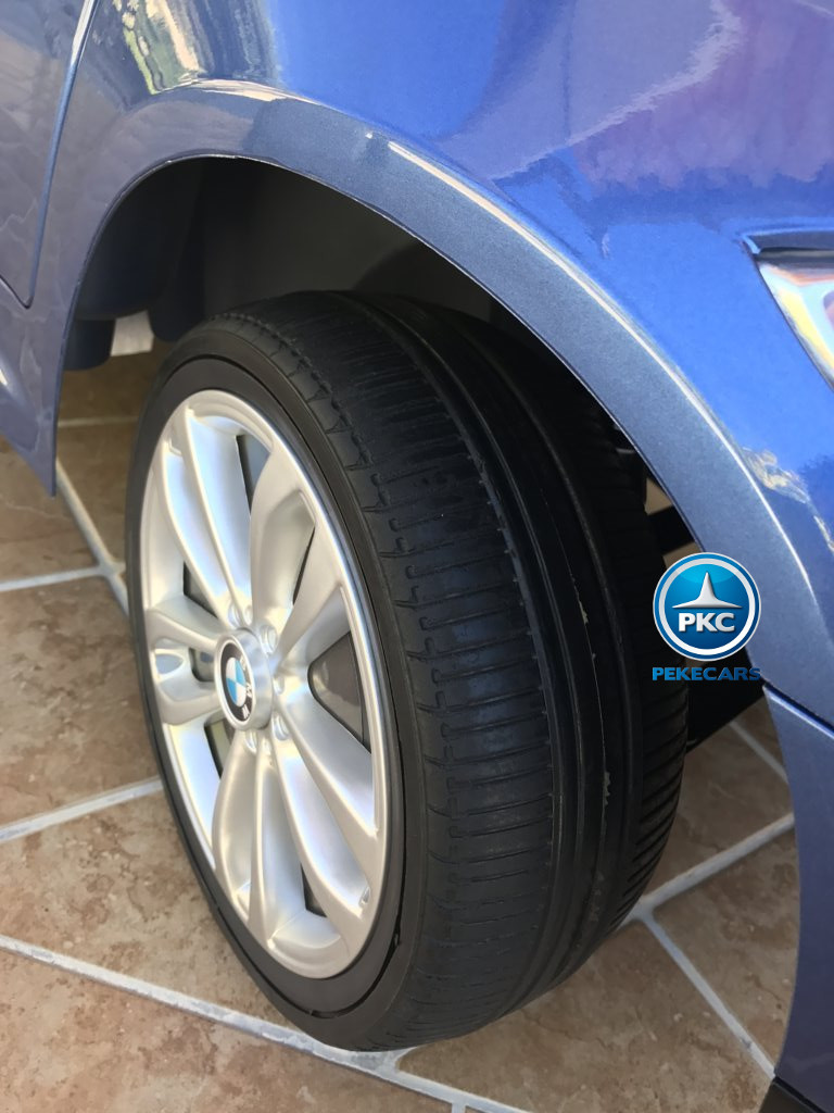 Coche electrico infantil BMW X6 Azul Metalizado con ruedas de caucho antipinchazos