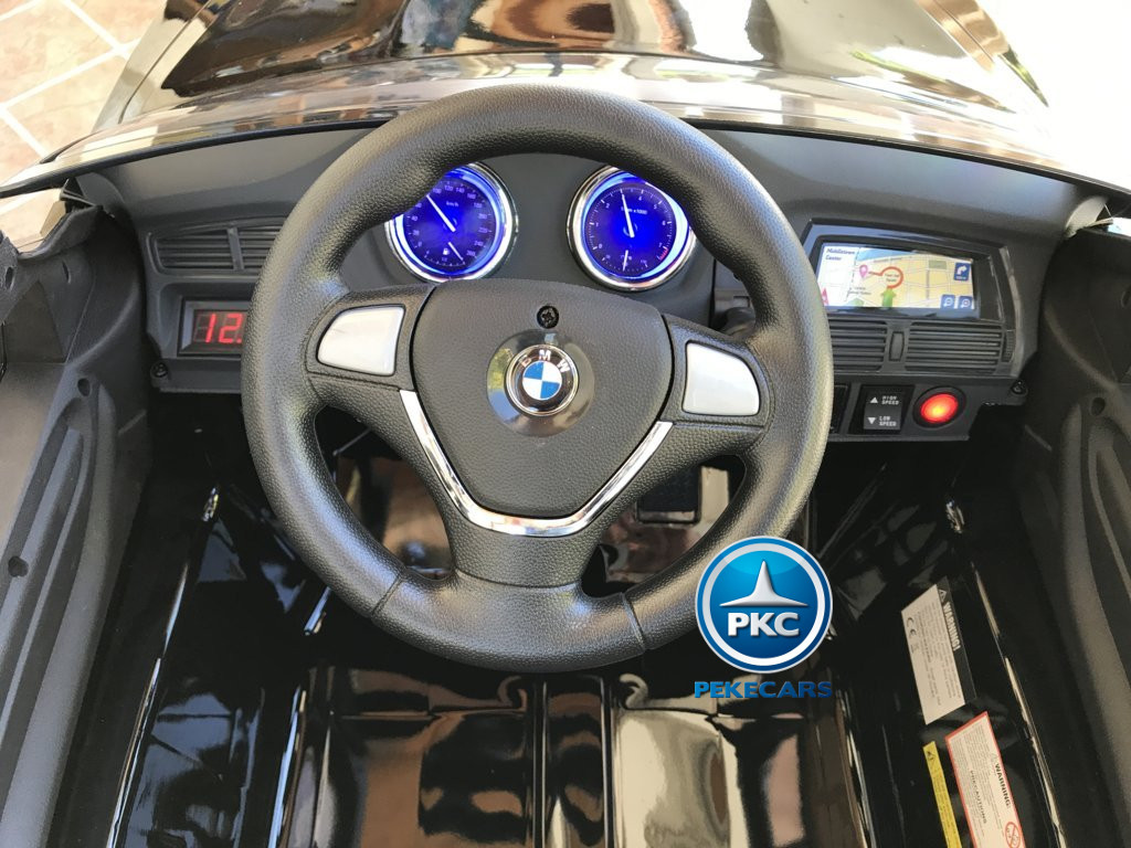 Coche electrico para niños BMW X6 Negro Metalizado volante con sonidos