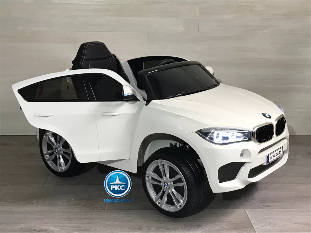 Coche electrico para niños BMW X6M Blanco con apertura de puertas