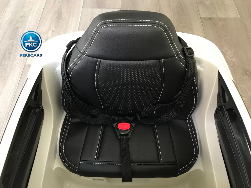 Coche electrico para niños BMW X6M Blanco asiento con cinturon