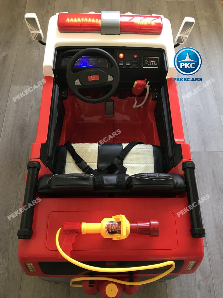 Coche electrico infantil camion de bomberos 12V detalles del interior