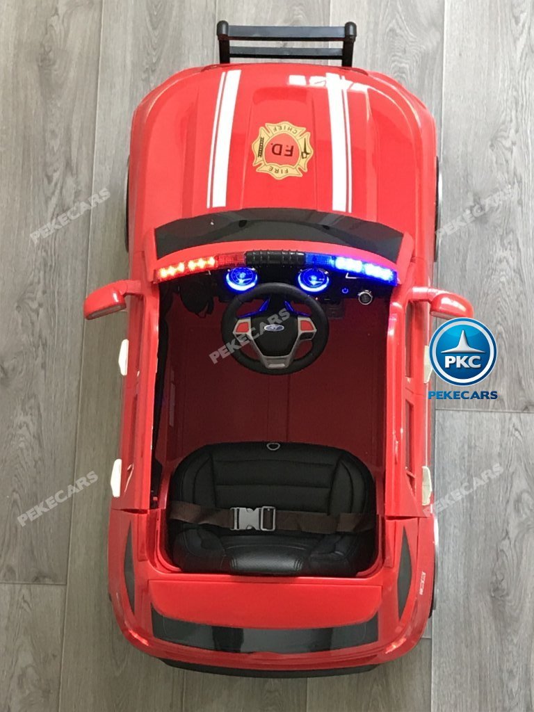 Coche electrico infantil jefe de bomberos 12V rojo detalles del interior