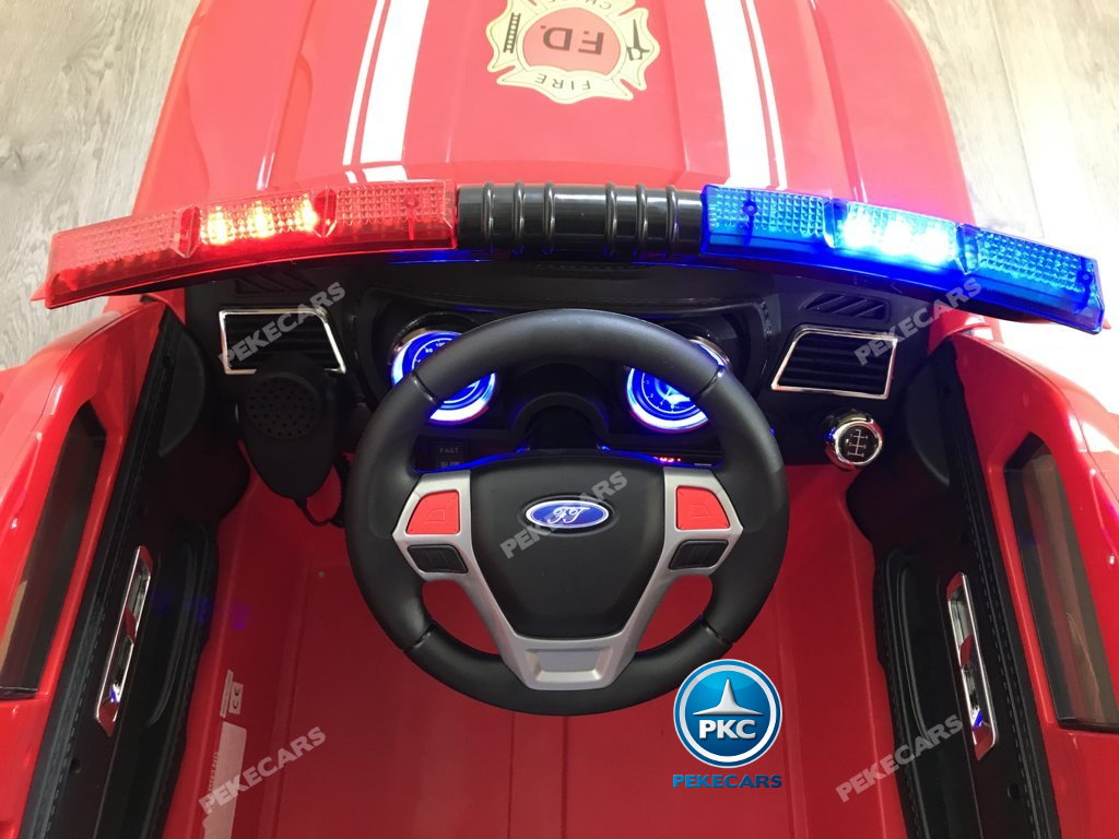 Coche electrico infantil jefe de bomberos 12V rojo volante con musica y claxon