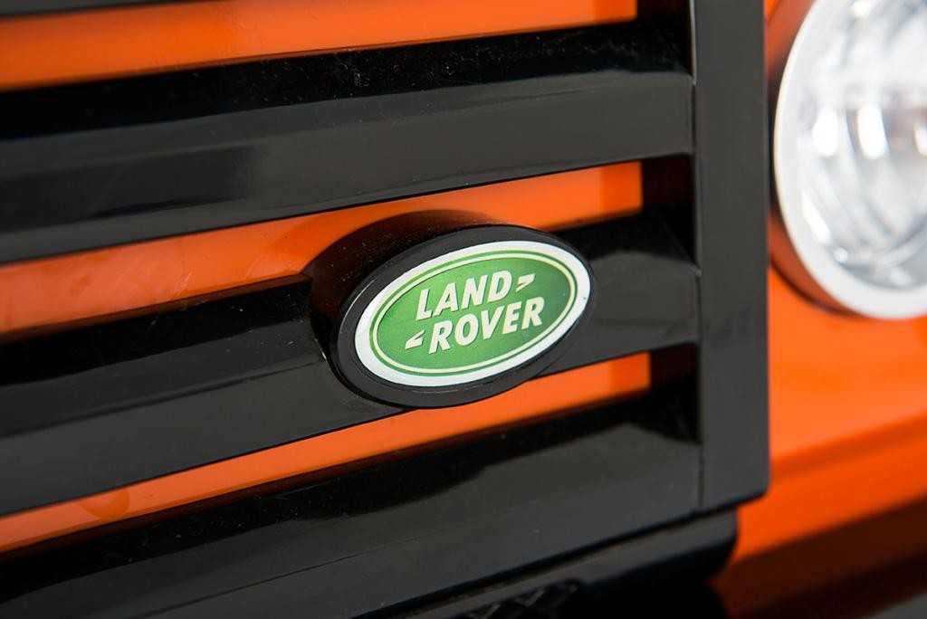 Comprar Todoterreno electrico para niños Land Rover Defender Naranja con licencia oficial