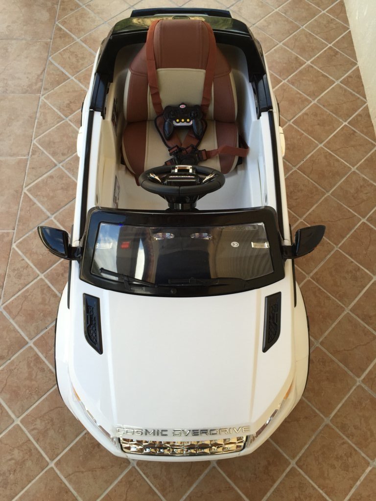 Coche electrico para niños evoque style blanco detalles del capo