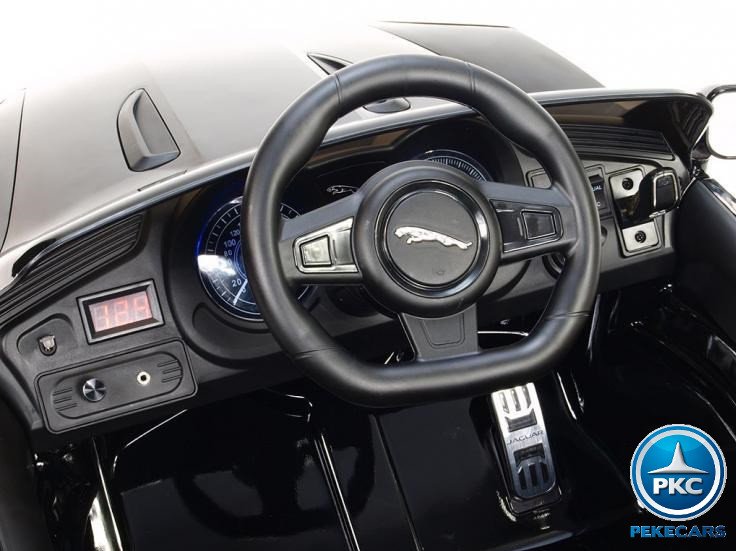 Coche electrico para niños Jaguar F-Type negro metalizado volante con claxon