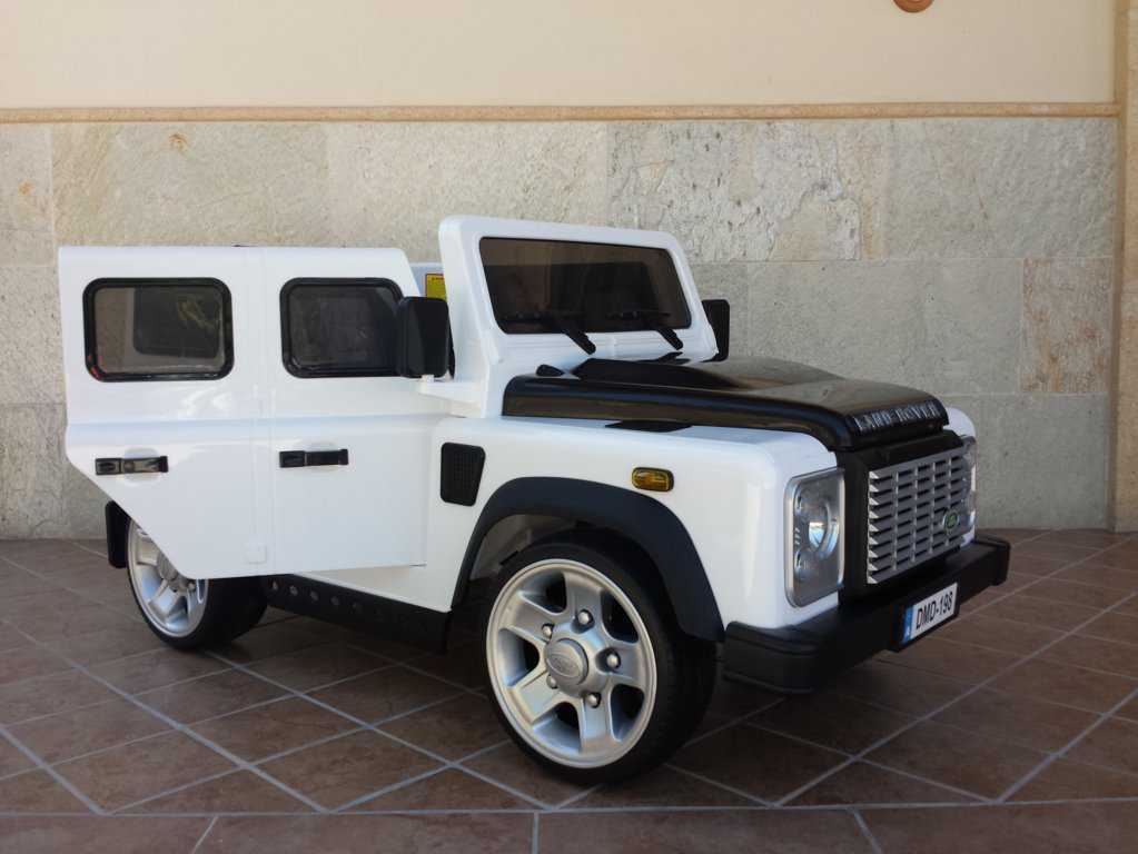 Todoterreno electrico para niños Land Rover Defender Blanco con apertura de puertas