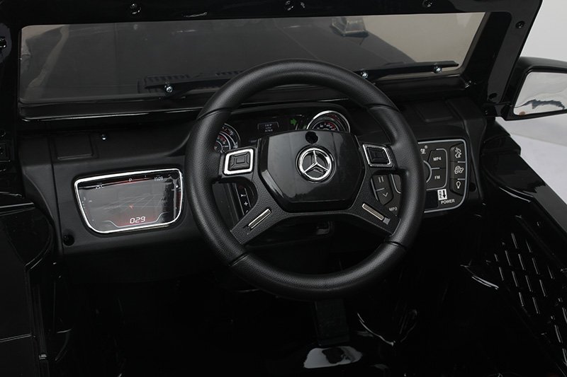 Todoterreno electrico para niños Mercedes G63 Negro volante