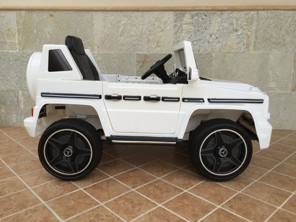 Todoterreno electrico para niños Mercedes G63 Blanco de lado
