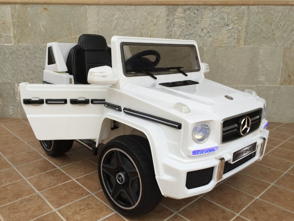 Todoterreno electrico para niños Mercedes G63 Blanco apertura de puertas
