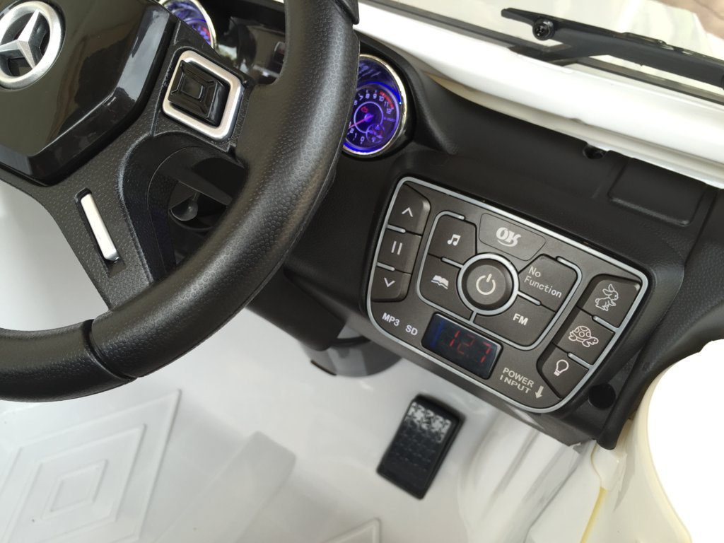 Todoterreno electrico para niños Mercedes G63 Blanco nuevo dashboard