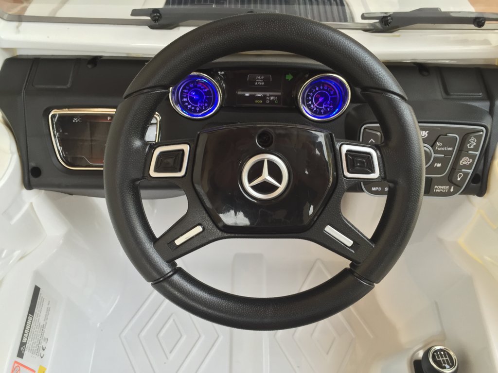 Todoterreno electrico para niños Mercedes G63 Blanco volante