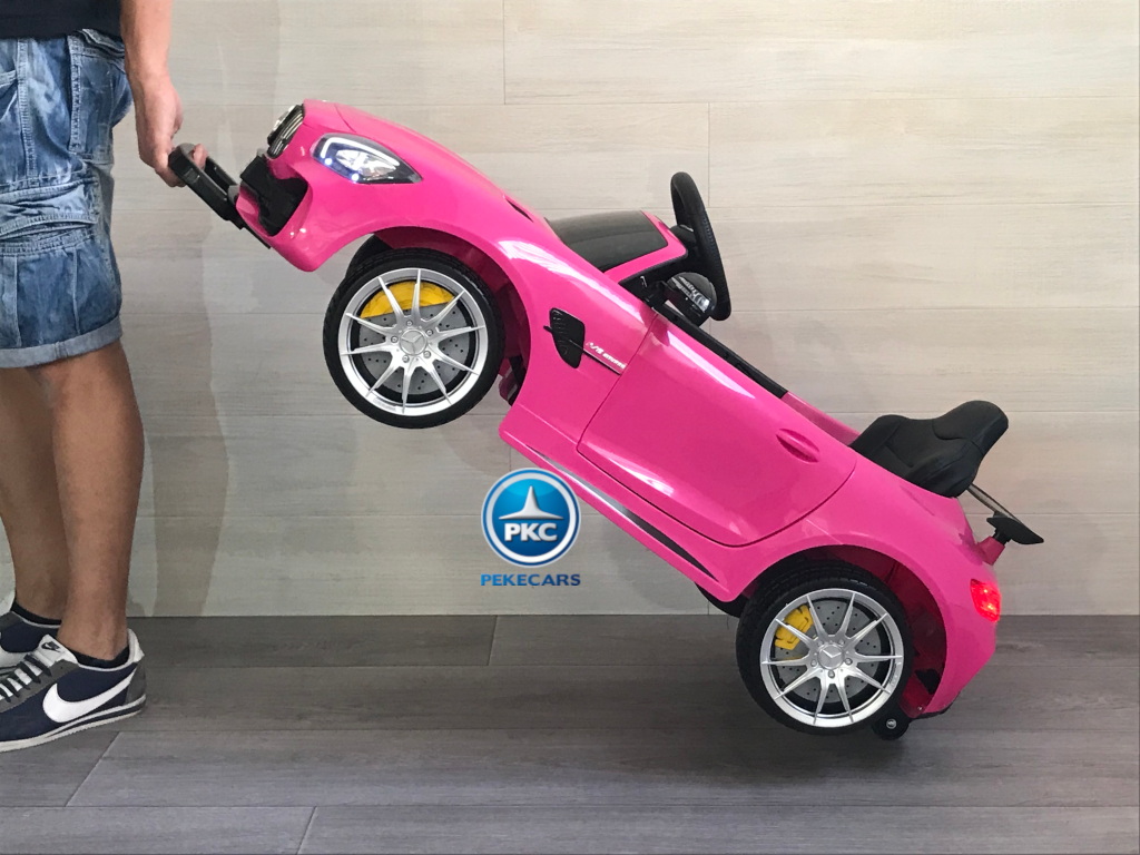 Coche electrico para niños Mercedes GTR 12V Rosa con asa de transporte
