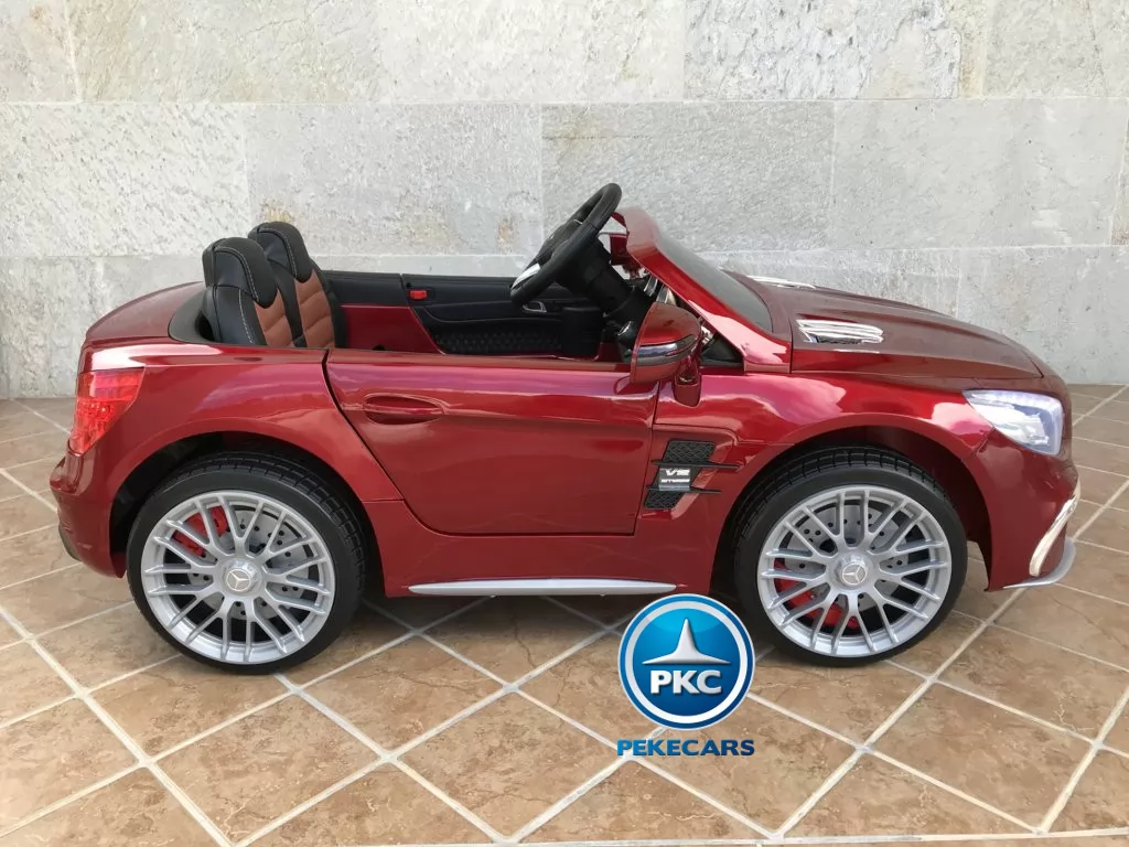 Coche electrico infantil Mercedes SL65 con MP4 Rojo Metalizado vista lateral