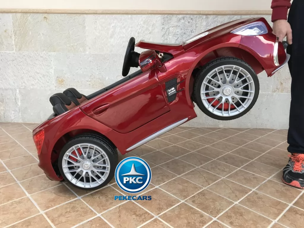 Coche electrico infantil Mercedes SL65 con MP4 Rojo Metalizado con asa de transporte