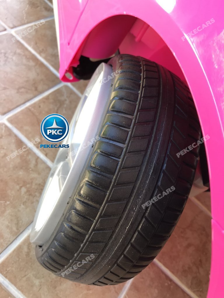 Coche electrico para niños mercedes a45 Rosa luces delanteras