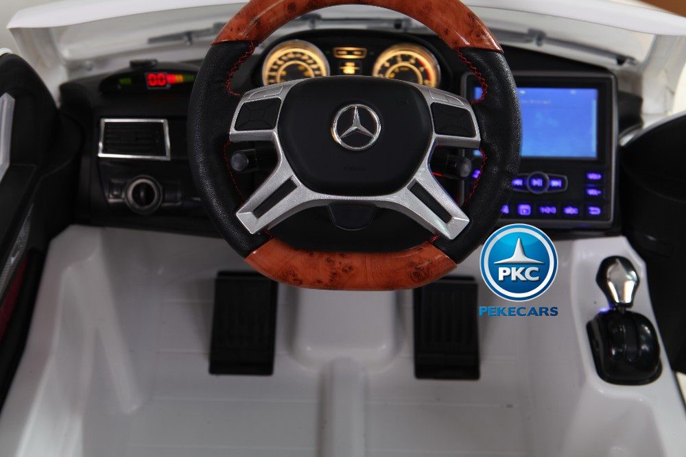 Coche electrico para niños Mercedes GL63 Version Superior Blanco volante en madera