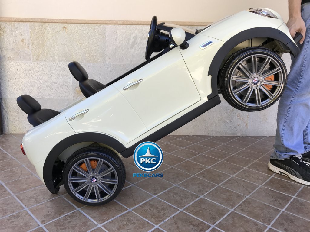 Coche electrico para niños Mini Style Rojo con asa de transporte