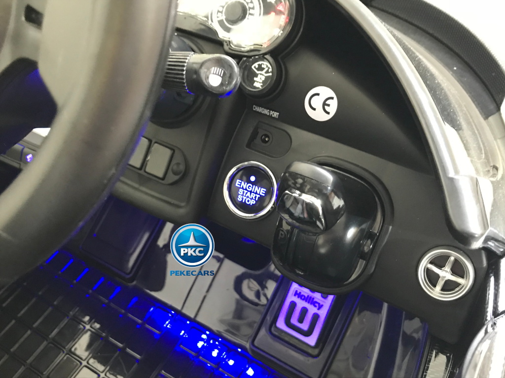 Coche electrico infantil Pagani Zonda Blanco boton de encendido