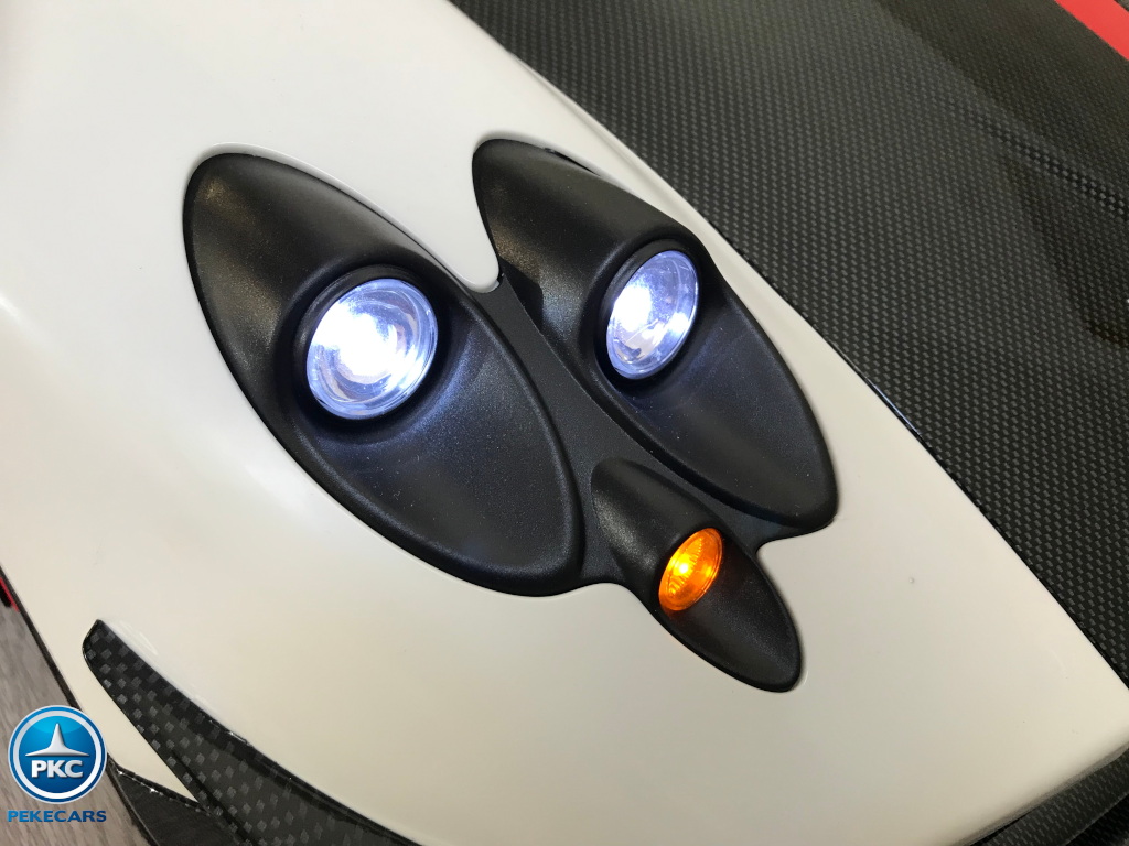 Coche electrico infantil Pagani Zonda Blanco luces delanteras