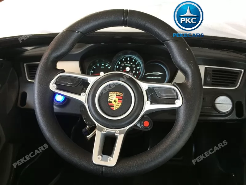 Coche electrico para niños Porsche Macan Negro volante con musica y claxon