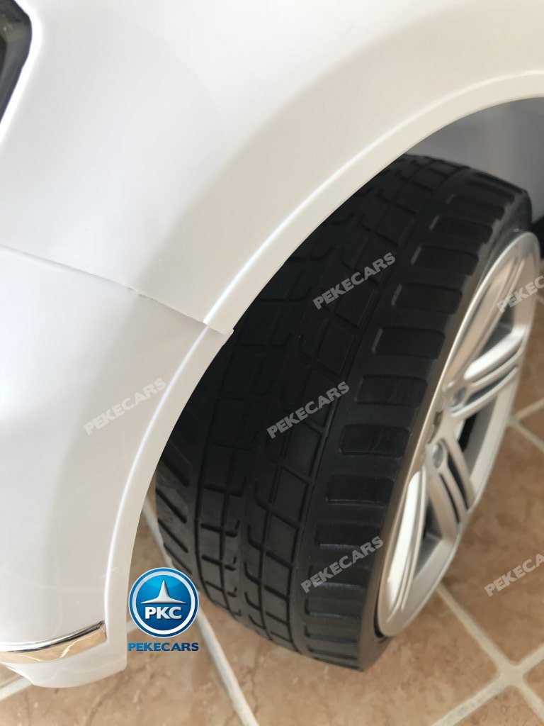 Coche electrico infantil Volkswagen Touareg Blanco con MP4 ruedas de caucho antipinchazos