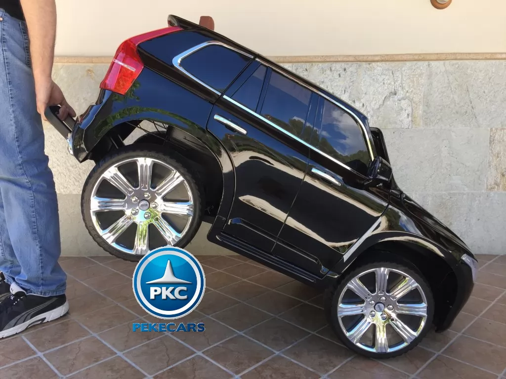 Coche electrico infantil Volvo XC90 Negro Metalizado con asa de transporte