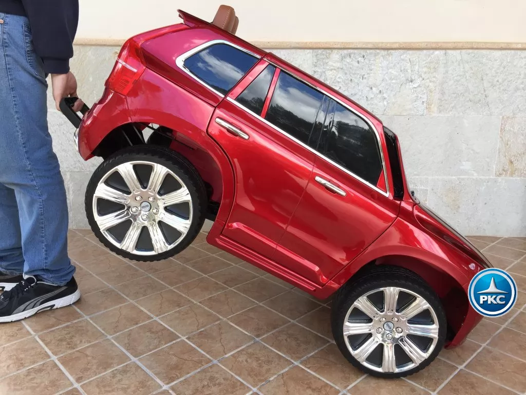 Coche electrico para niños Volvo XC90 Rojo Metalizado con asa de transporte