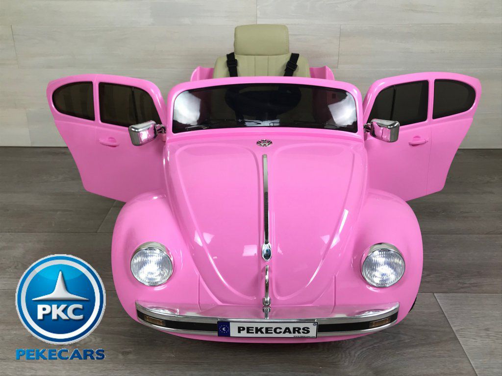 Beetle clásico color rosa vista frontal puertas abiertas