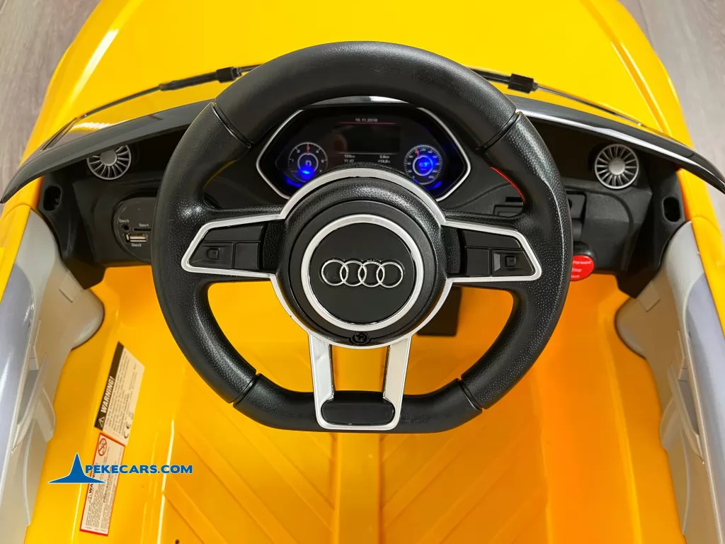 Coche electrico para niños Audi TT Amarillo volante