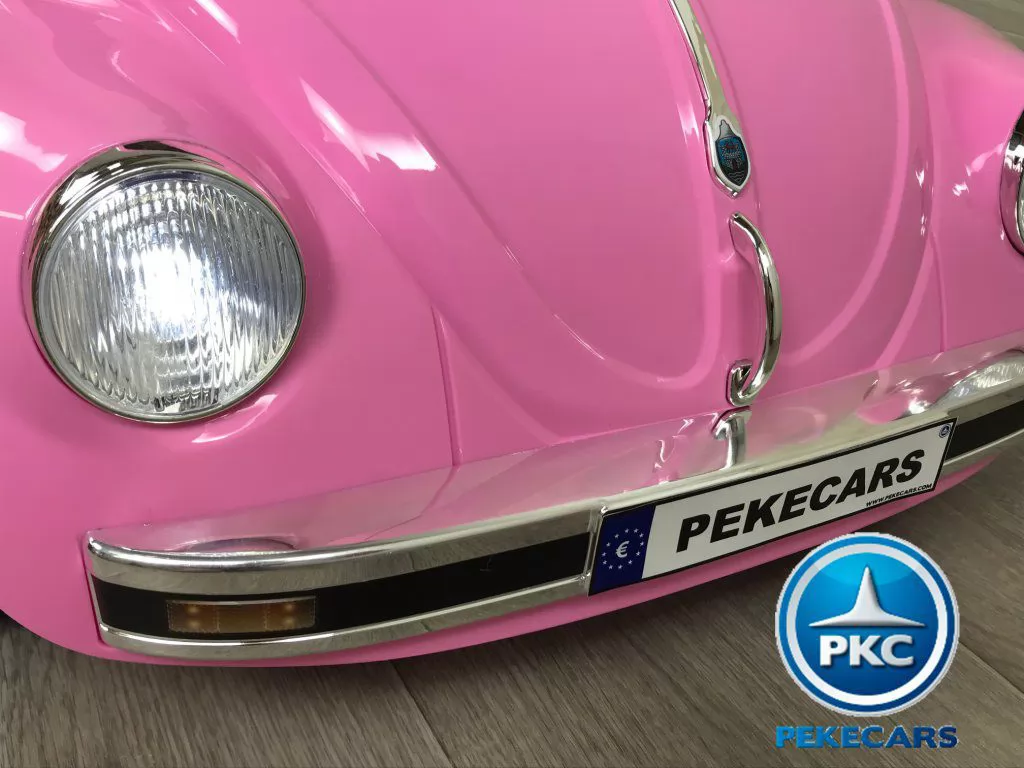 Beetle clásico color rosa vista faro delantero