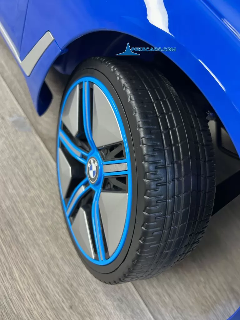 Coche eléctrico para niños BMW I4 12V 2.4G Azul ruedas