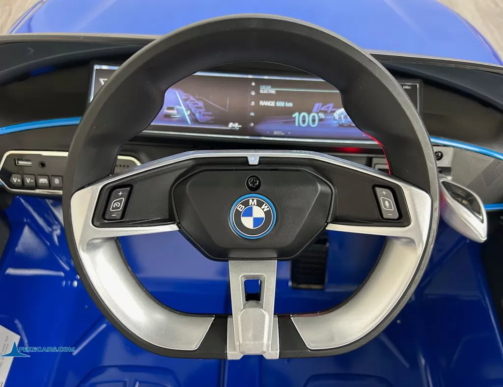 Coche eléctrico para niños BMW I4 12V 2.4G Azul volante