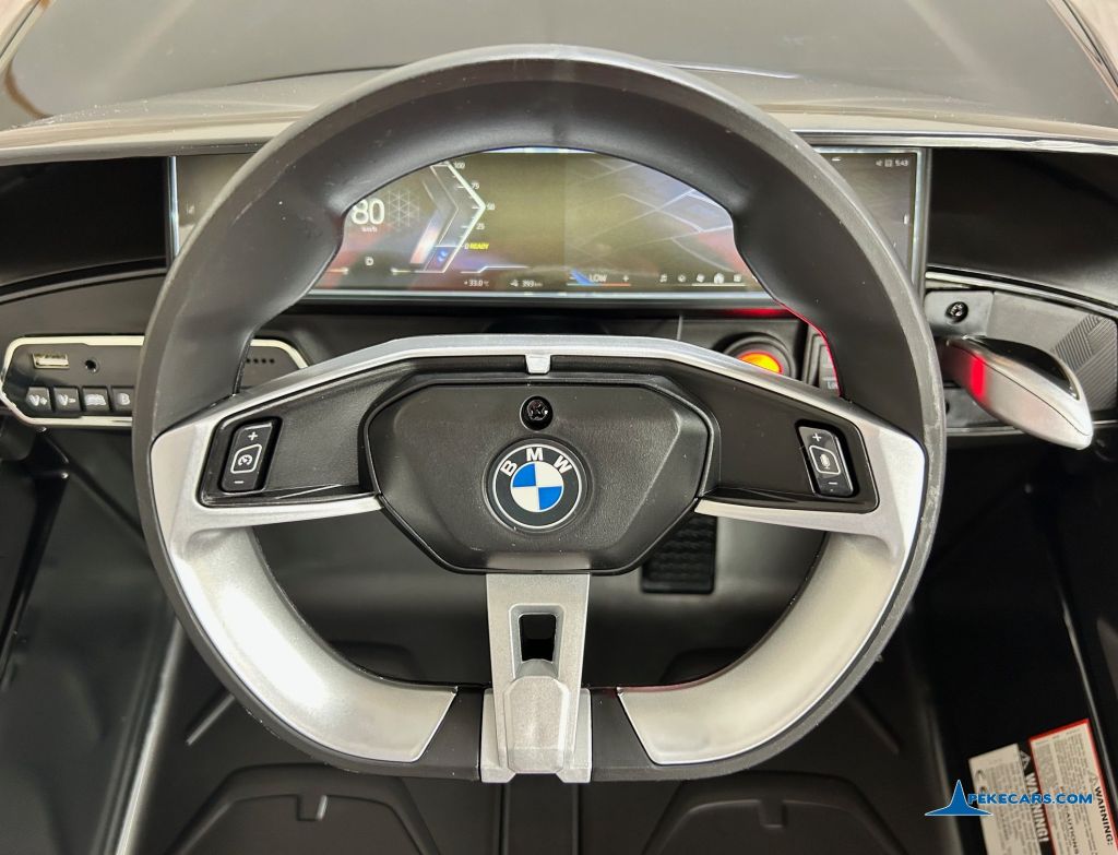 Coche eléctrico para niños BMW I4 12V 2.4G Negro volante